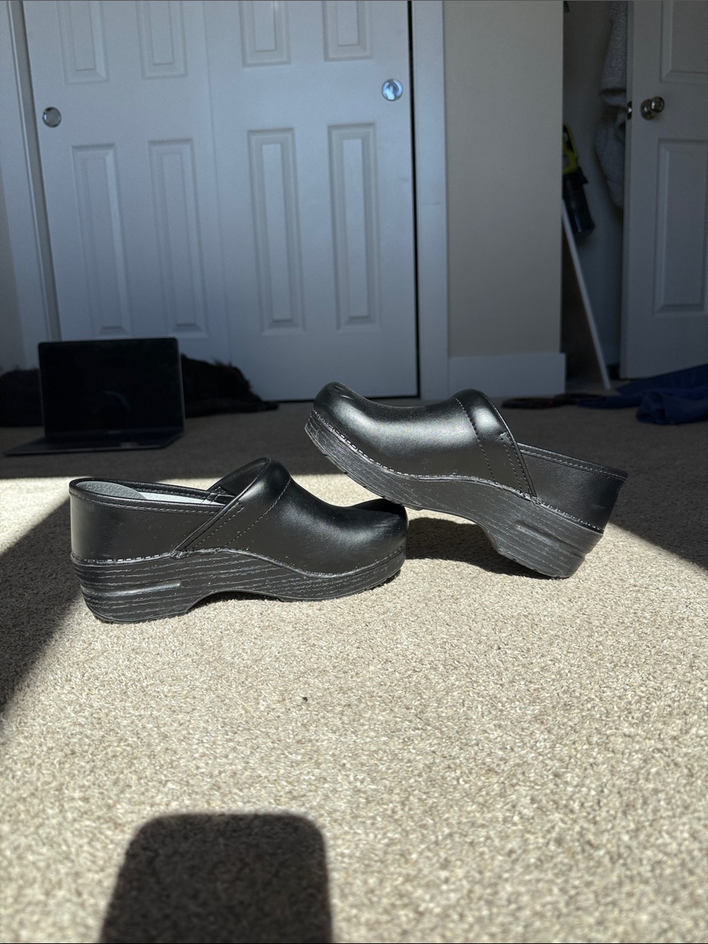 Dansko Black Leather Slip-On Clogs with Platform Sole